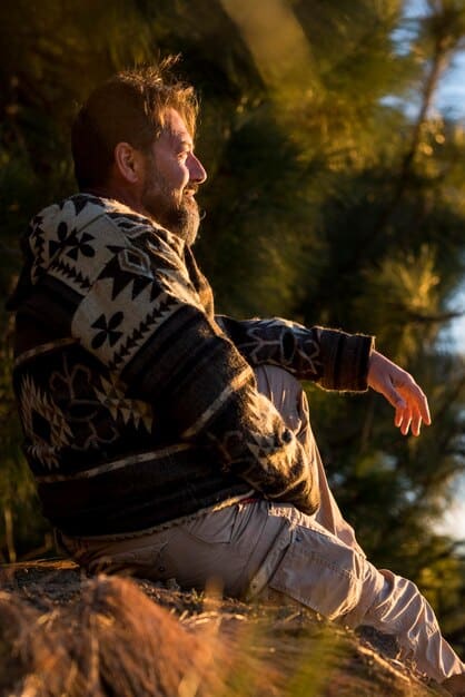 A behind-the-scenes image of Liam Hemsworth during stunt training for The Witcher Season 4, showcasing his dedication to mastering Geralt's combat skills. He is practicing sword movements with a trainer, highlighting his commitment to the physical aspects of the role.