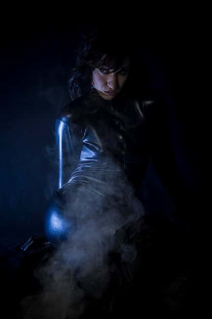 A close-up shot of Yennefer, Tissaia, and Vilgefortz in a dimly lit chamber, engaged in a tense discussion. The lighting highlights the shadows on their faces, suggesting hidden motives and conflicting loyalties.