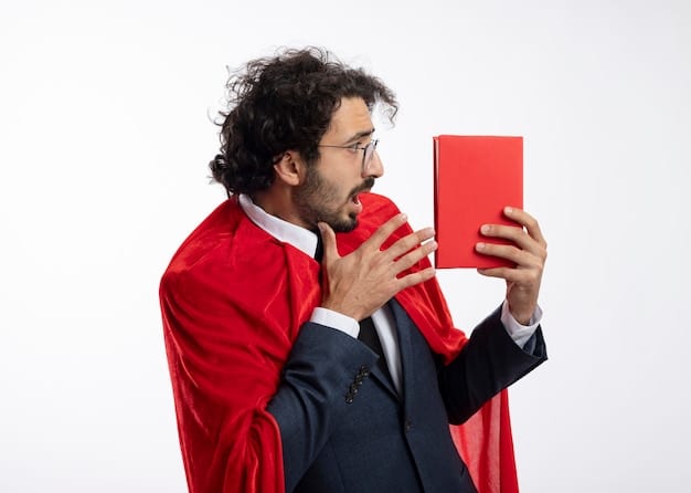 A person carefully holding a well-preserved comic book in gloved hands. The comic features a popular character in their classic costume, with a backdrop of other graded comics in protective cases.