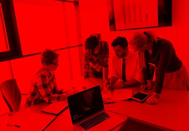 A group of CD Projekt Red developers collaborating on a project, showcasing teamwork and innovation.