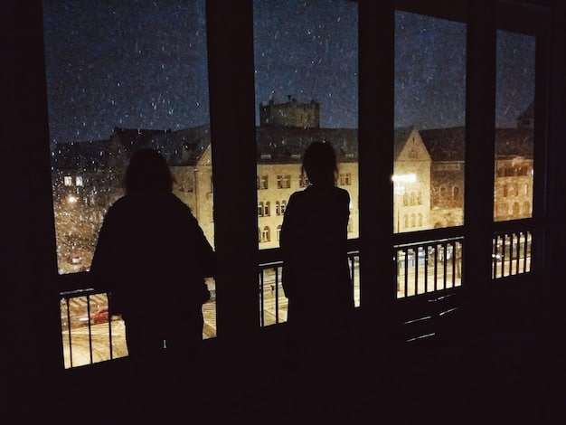 A group of tourists, equipped with EMF readers and cameras, exploring a dimly lit, historical hotel room during a ghost tour.