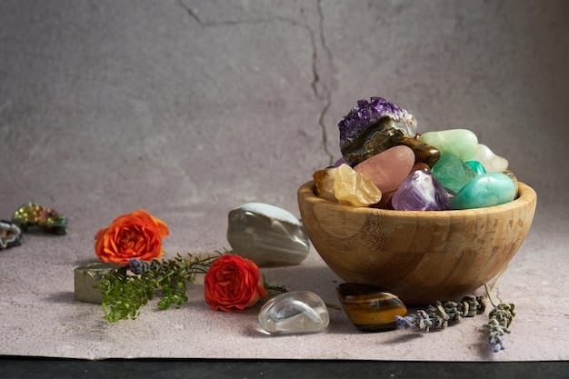 A selection of various crystals arranged on a wooden table, including amethyst, rose quartz, and citrine. The image is shot from a slightly overhead angle, showcasing the diversity of crystal colors and shapes.