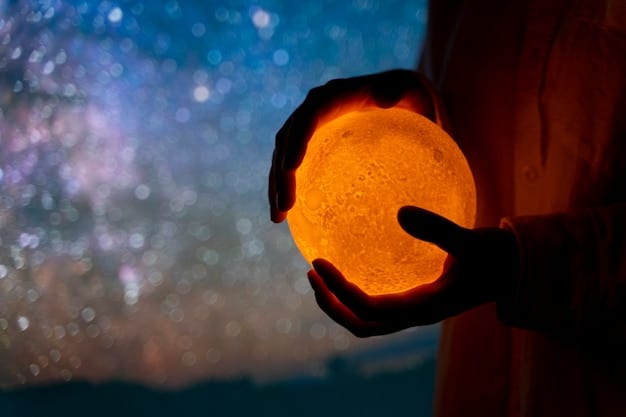A close-up of a hand holding a crystal ball, within which swirling colors and images of stars and planets can be seen.