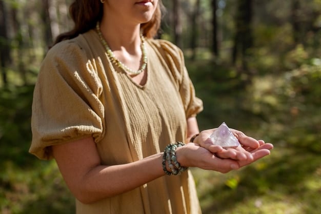 A person is meditating outdoors, holding a piece of lapis lazuli crystal in their hand, while sunlight filters through the trees, creating a serene and peaceful atmosphere.