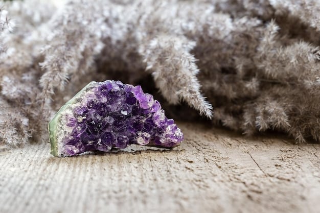 A close-up shot of an amethyst crystal cluster on a crystal altar, surrounded by clear quartz points and a small white candle. The background is blurred, emphasizing the beauty and energy of the amethyst.