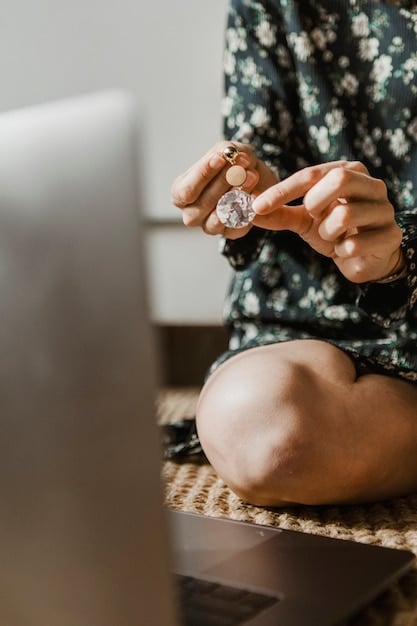 A close-up shot of a person meditating with a citrine crystal in their hand. The background is soft and blurred, featuring candles and a serene setting, emphasizing the meditative and spiritual aspect of crystal healing for abundance.