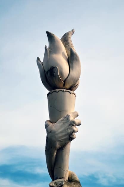 A close-up shot of hands gently holding a small statue of a deity. The background is blurred, emphasizing the connection between the individual and the divine figure. Soft lighting enhances the sense of reverence and intimacy in honoring gods and goddesses.