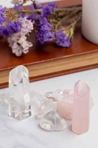 A close-up shot of various crystals (amethyst, rose quartz, clear quartz) arranged on a meditation mat, with a soft, blurred background. This image represents the tools used to Amplify Your Meditation: A Guide to Using Crystals for Deeper Spiritual Connection.