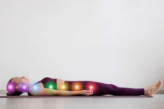 A person lying on their back with various chakra crystals placed along their body at the locations of the seven major chakras. The person is meditating with eyes closed and hands resting at their sides. The image emphasizes the crystal placement technique described in Crystal Healing for Chakras: A Comprehensive Guide to Balancing Energy Centers.