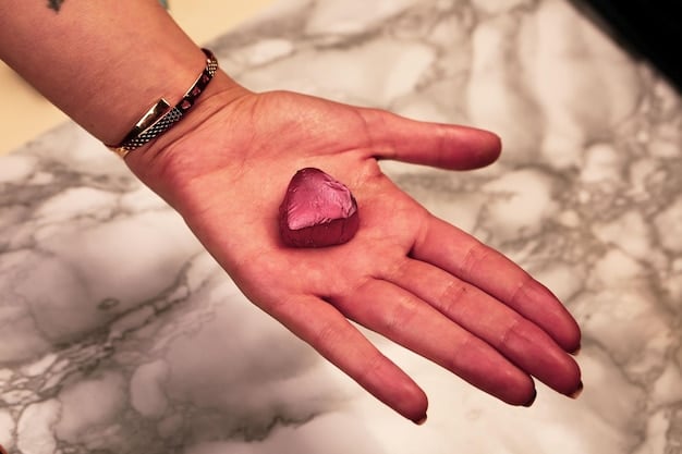 Close-up of a hand gently placing a rose quartz crystal on the heart chakra of a person lying down, emphasizing the heart chakra placement technique for 'Wearing Crystals: Maximize Their Benefits with These Placement Tips'.